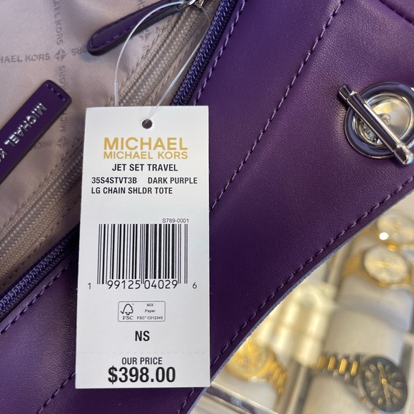 MICHAEL KORS 
Jet Set Travel Lg Signature Chain Shoulder Tote 
Dark Purple 
NWT - Picture 9 of 16